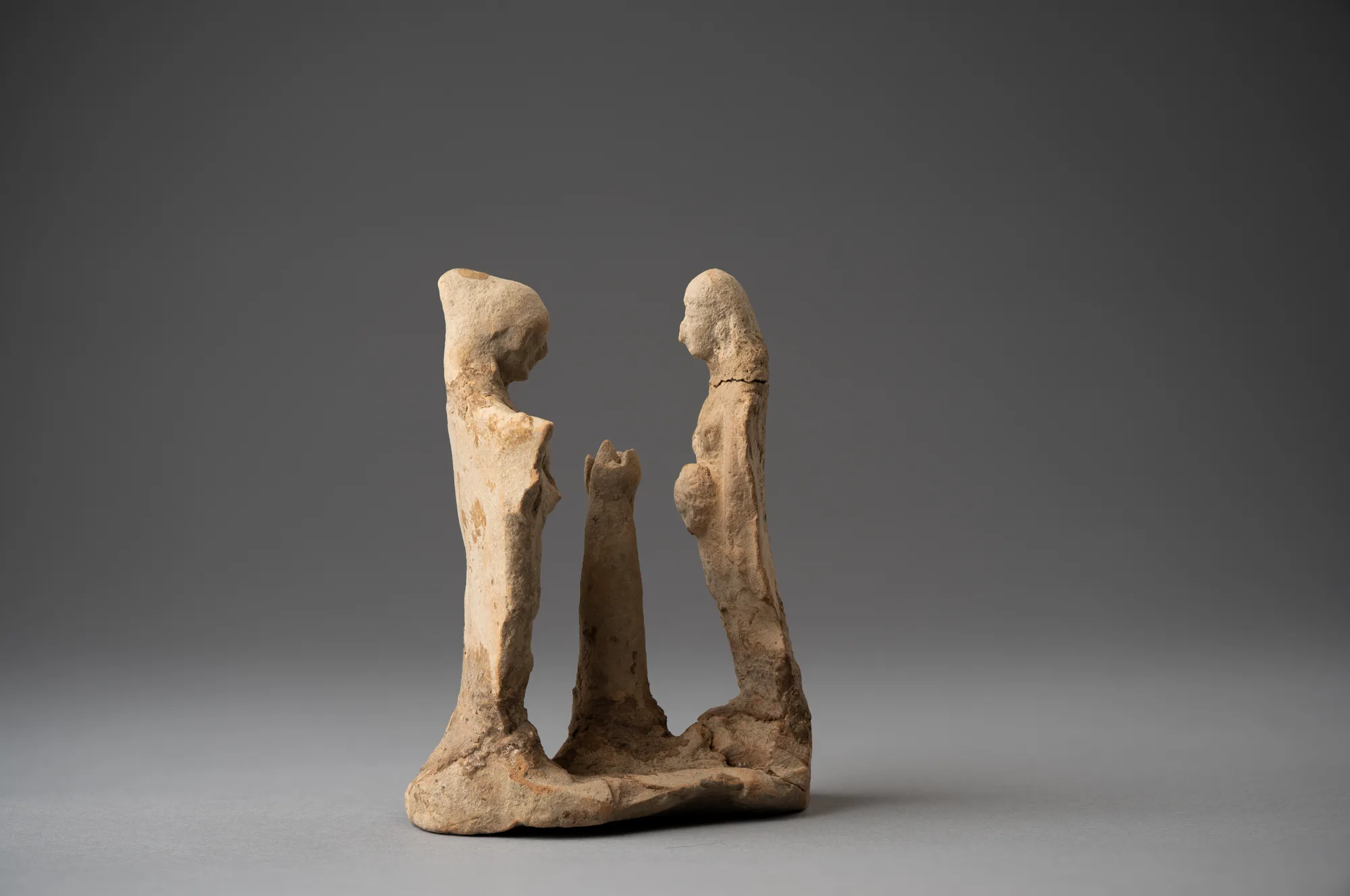 Two Veiled Figures from a Terracotta Ring-Dance Group, with the Stump of the Central Tree, Archaic Cypriot statue