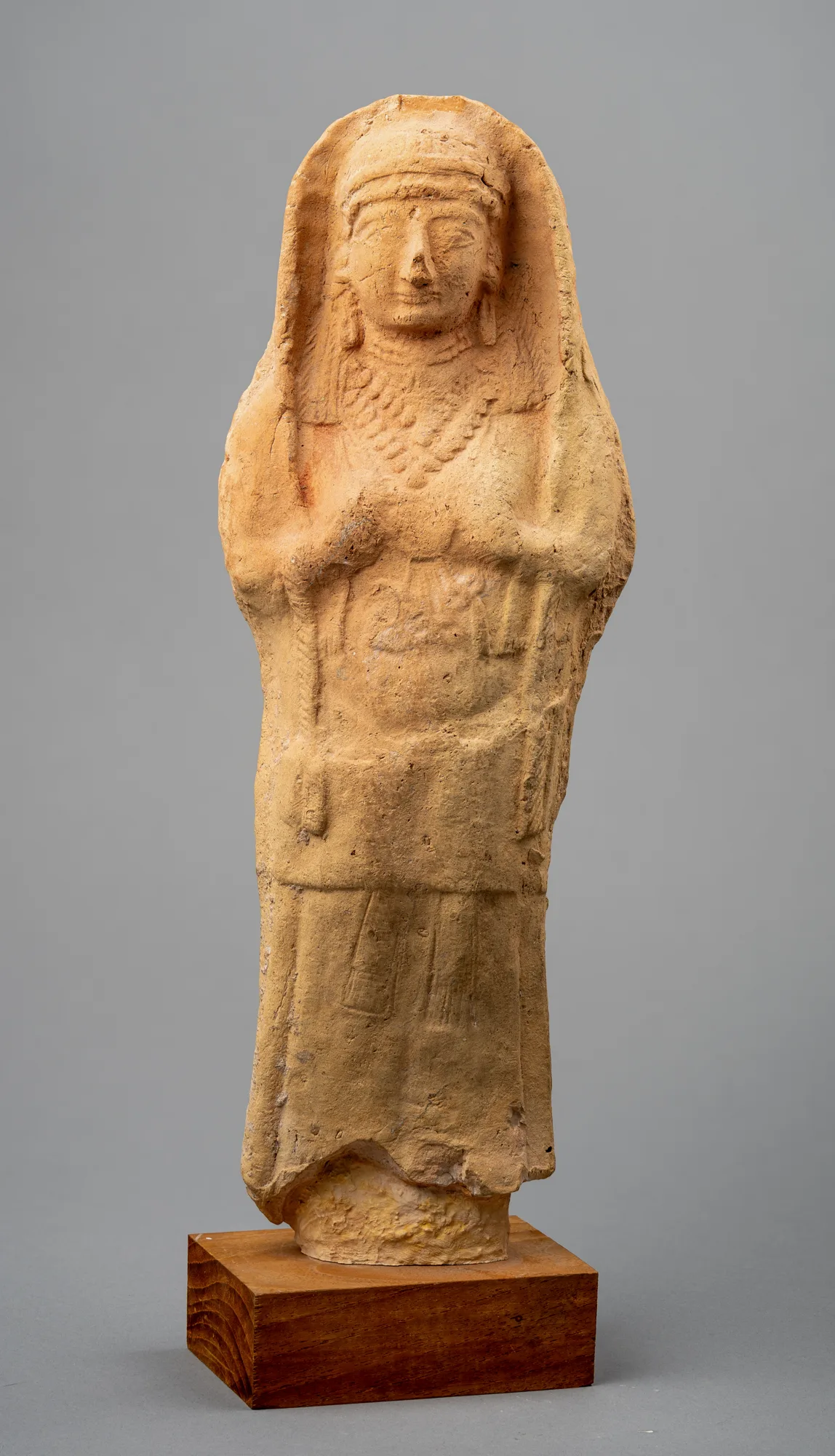 Hollow Mould-Made Female Votary of the Achna Type, Hands to the Breasts, Archaic II Cypriot statue