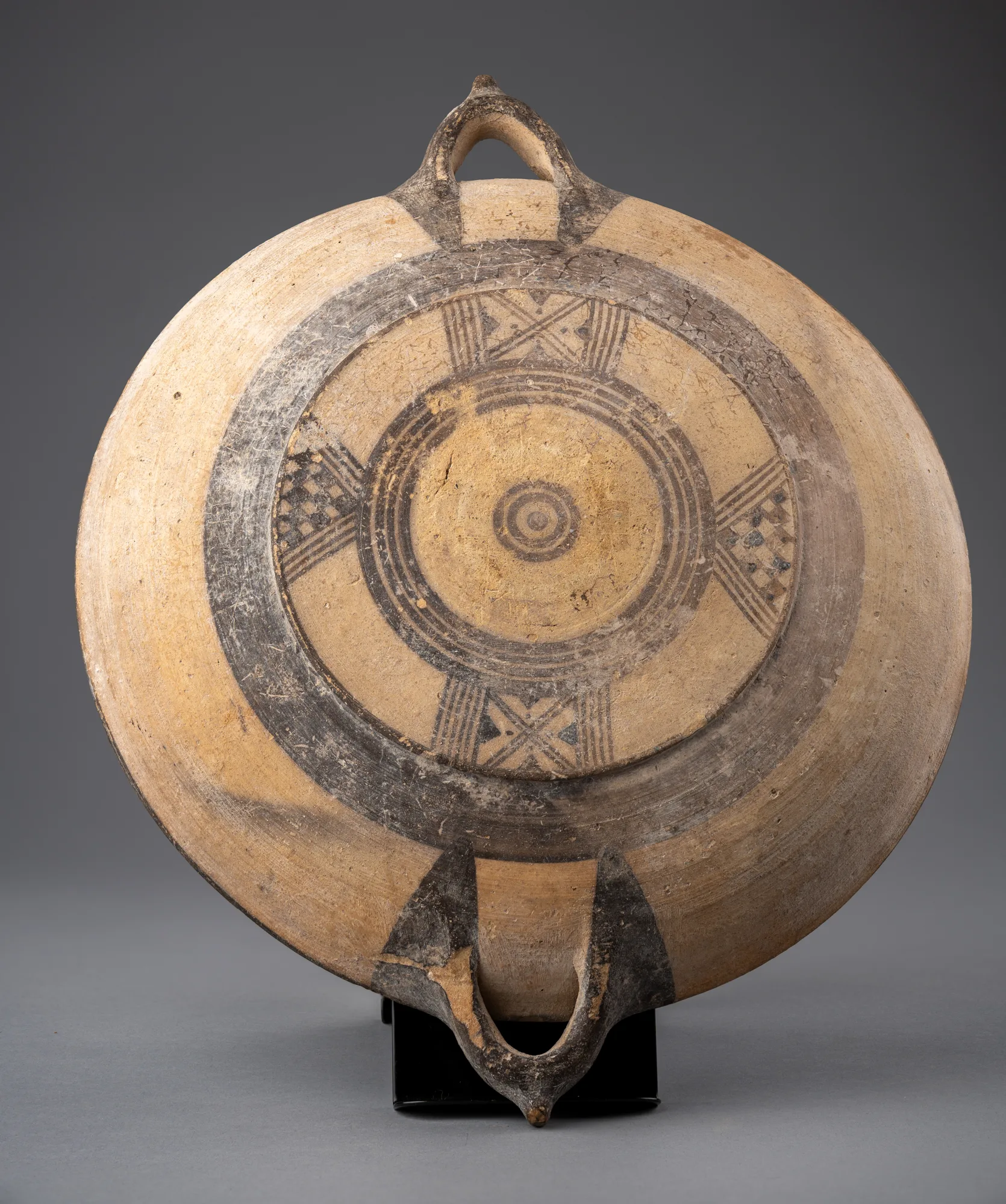 Large White Painted Plate with Knobbed Handles and a Four-Armed Cross on the Underside, Geometric I Cypriot dish