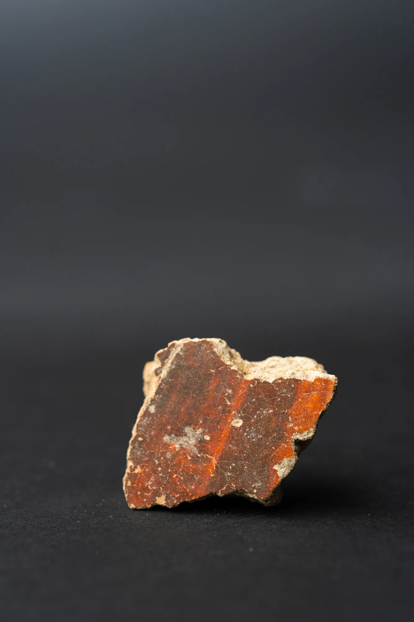 Red Lustrous Ware Body Sherd with Fire-Mottled Slip, Neolithic Cypriot pottery