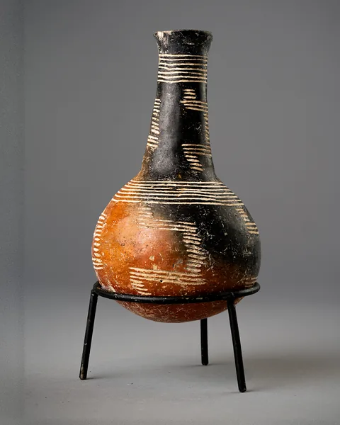 Red Polished Black-Topped Bottle with Stepped Incised Bands