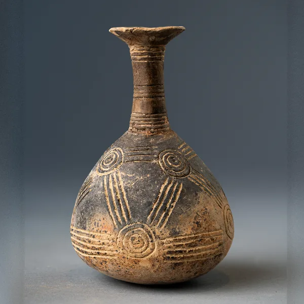 Red Polished Bottle with Linked Concentric Circles