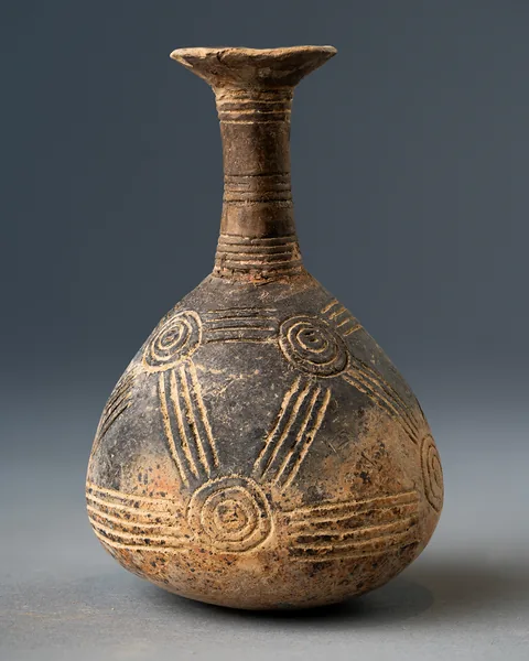 Red Polished Bottle with Linked Concentric Circles