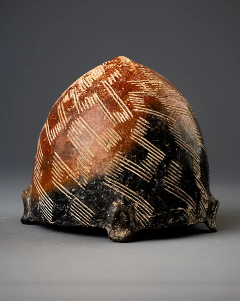 Black-topped Red Polished Tulip Bowl with Incised Hatched Lattice