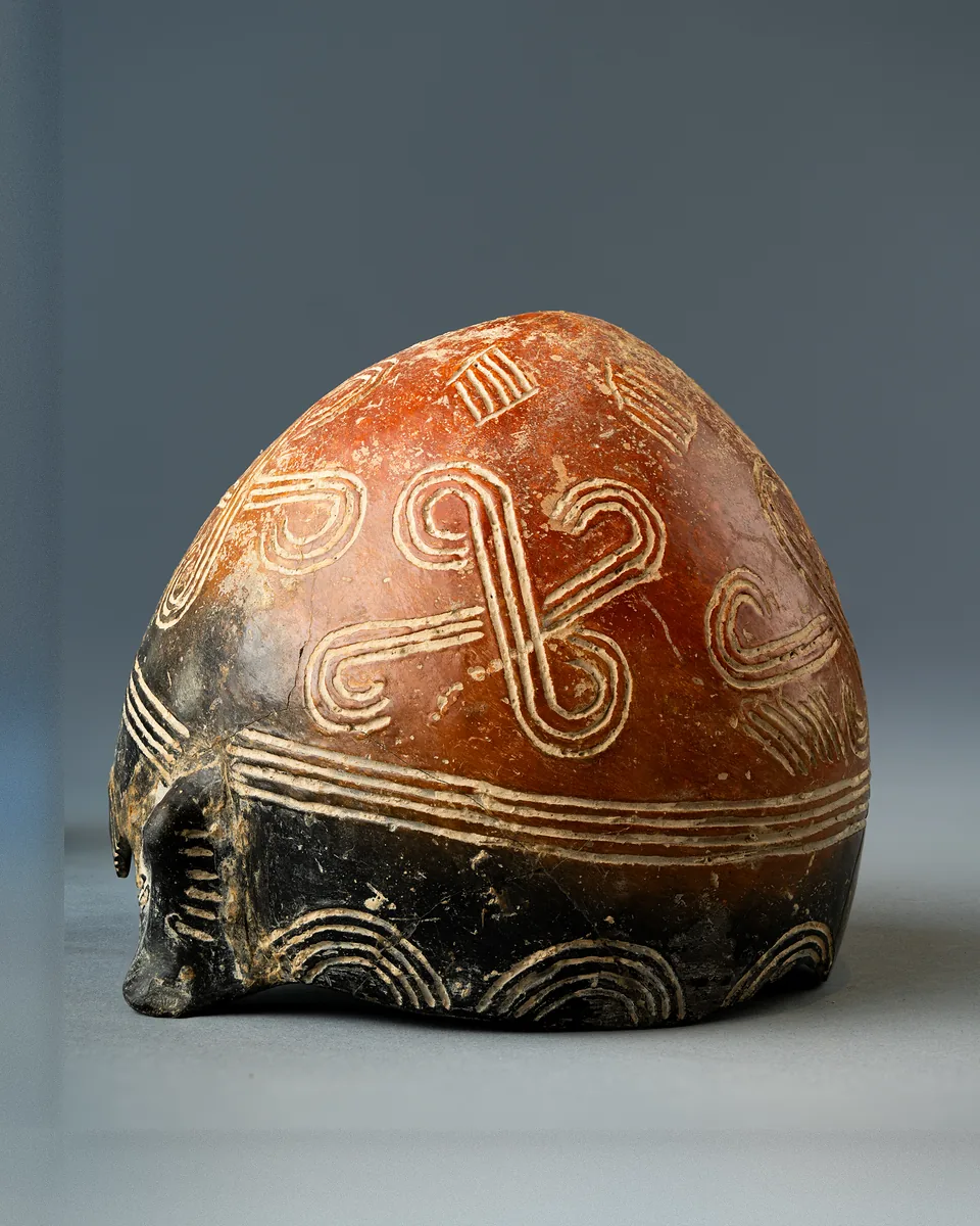 Black-topped Red Polished Tulip Bowl with Incised Spiral-armed Cross, Circles and Arcades
