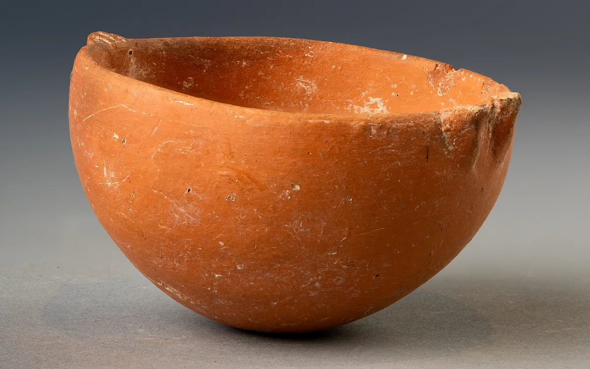 Red Polished Hemispherical Bowl with Two Rim Lugs