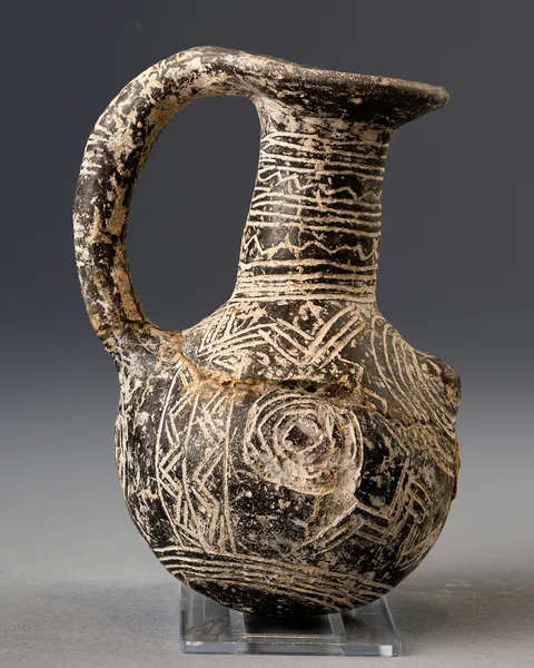 Black Polished Juglet with Incised Decoration and Circled Bosses