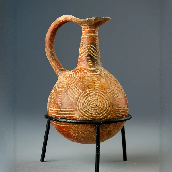 Red Polished Beak-Mouthed Jug with Concentric Circles and Chevrons