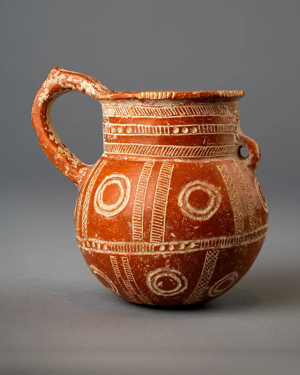 Red Polished One-Handled Jar with Concentric Circles, Deneia Style