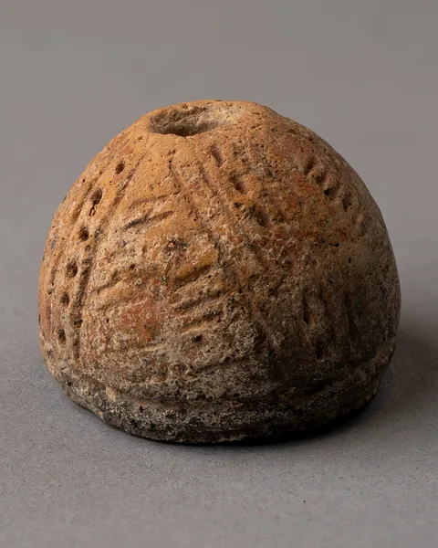 Red Polished Spindle Whorl with Incised Lattice and Dotted Bands
