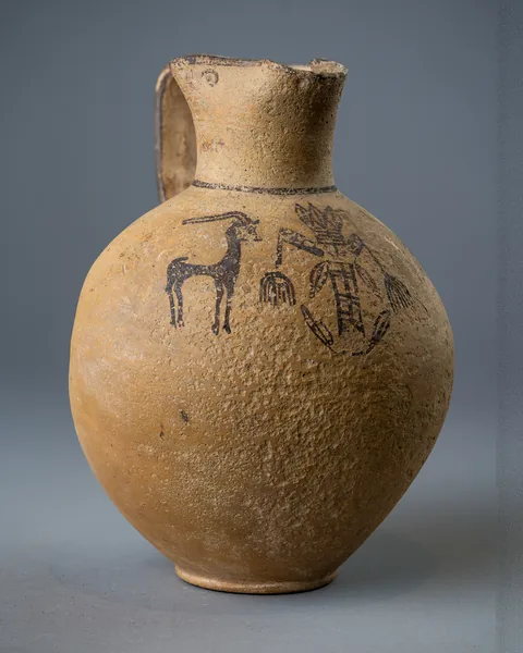 White Painted IV Trefoil Jug with a Wild Goat and a Composite Plant-like Figure