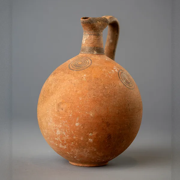 Black-on-Red Globular Trefoil Jug with Concentric Circles