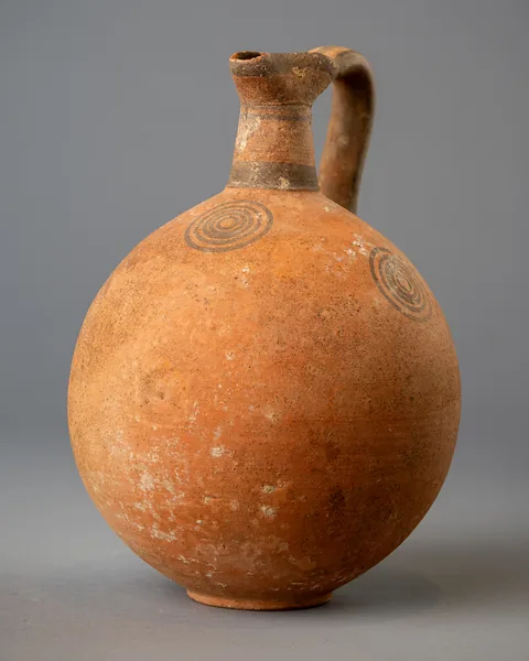 Black-on-Red Globular Trefoil Jug with Concentric Circles