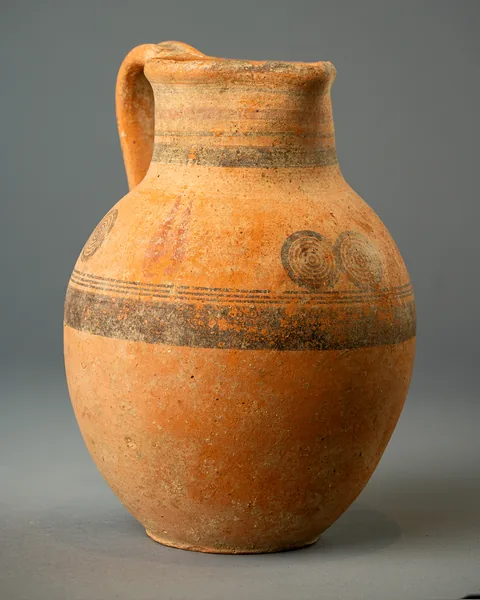 Bichrome Jug with Wide Neck, Shoulder Circles and Red Strokes