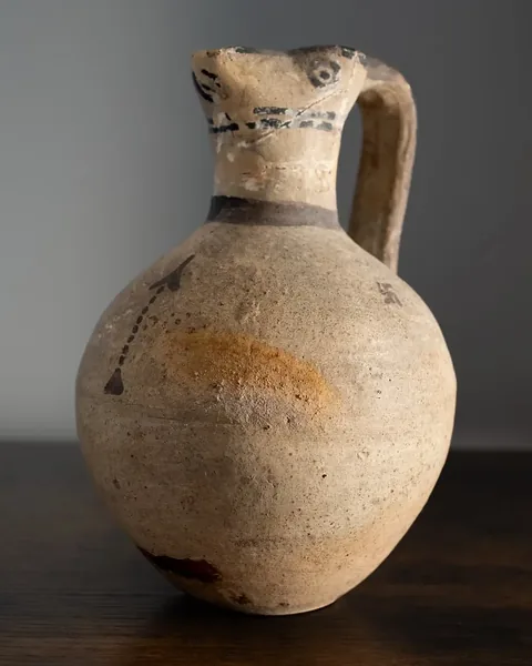 White Painted Jug with Painted Eyes, Chevron Arrow and Swastika