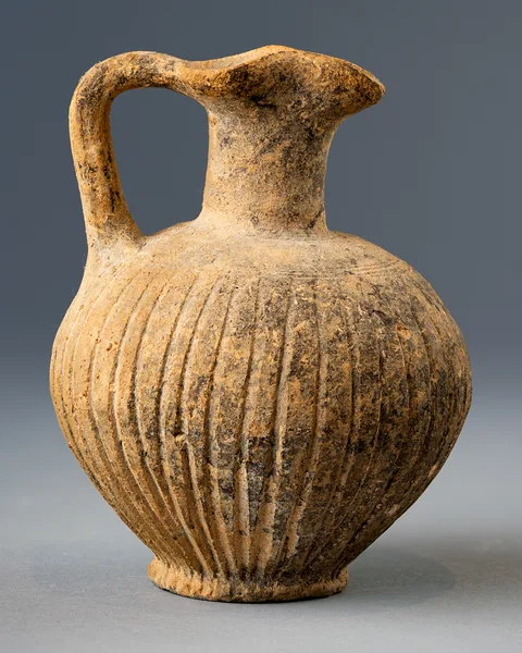 Black Slip Bucchero Jug with Trefoil Mouth and Fluted Body