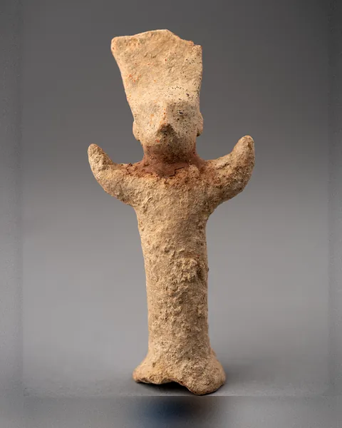 Terracotta Figure with Upraised Arms and Flaring Headdress
