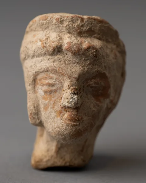 Mould-made Terracotta Head of a Woman with a Diadem and Painted Features