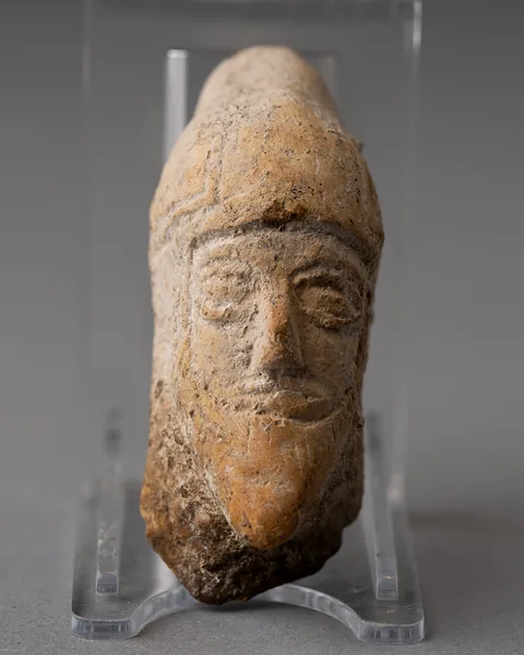 Terracotta Head of a Bearded Votary in a Pointed Cap