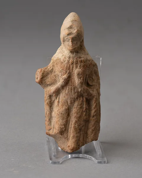 Mould-Made Figure of a Veiled Woman Holding a Flower