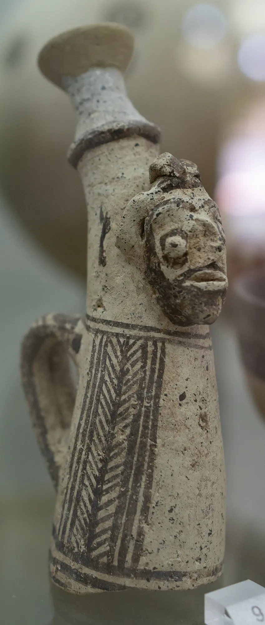 Small spout with an attached human face, Geometric II Cypriot complex vessel