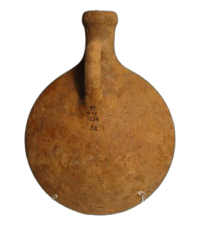 Round flat flask of smooth red clay with a narrow neck and one handle, its museum number written on the body