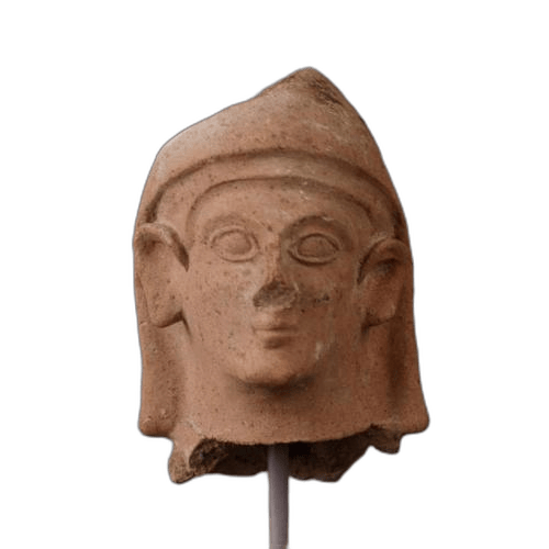 Head of male votary figure with head covering, Archaic I Cypriot statue
