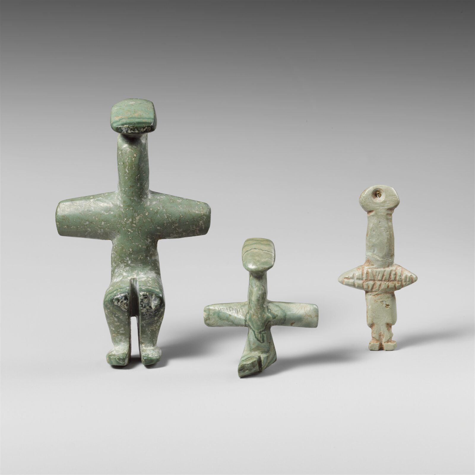 Three Chalcolithic picrolite cruciform figures in the Metropolitan Museum of Art