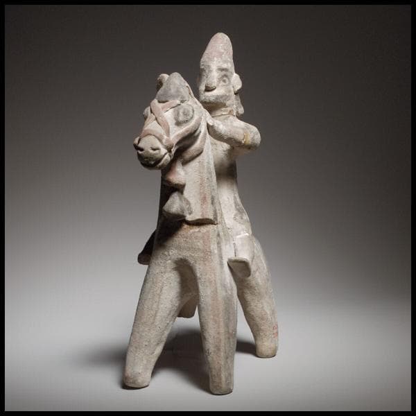 Horse and rider figurine