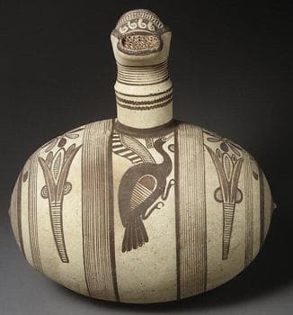 Terracotta barrel jug with strainer