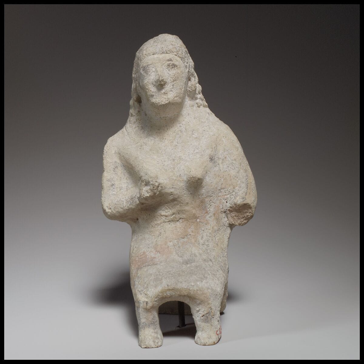 Seated female figurine, Archaic II Cypriot statue