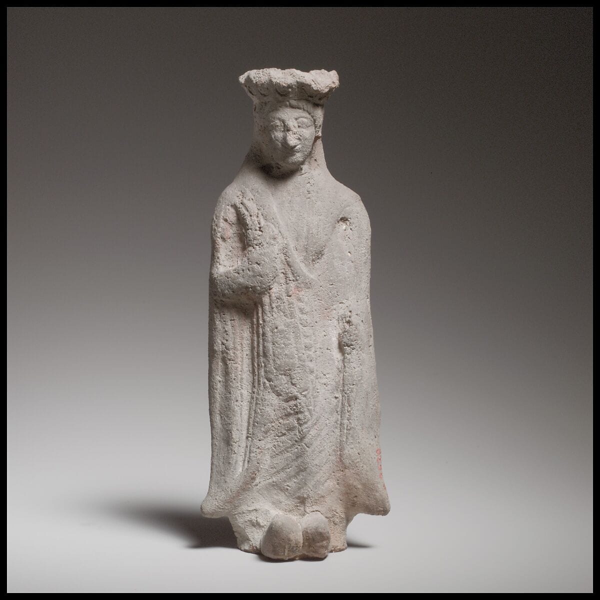 Terracotta statuette of a standing woman, Archaic II Cypriot