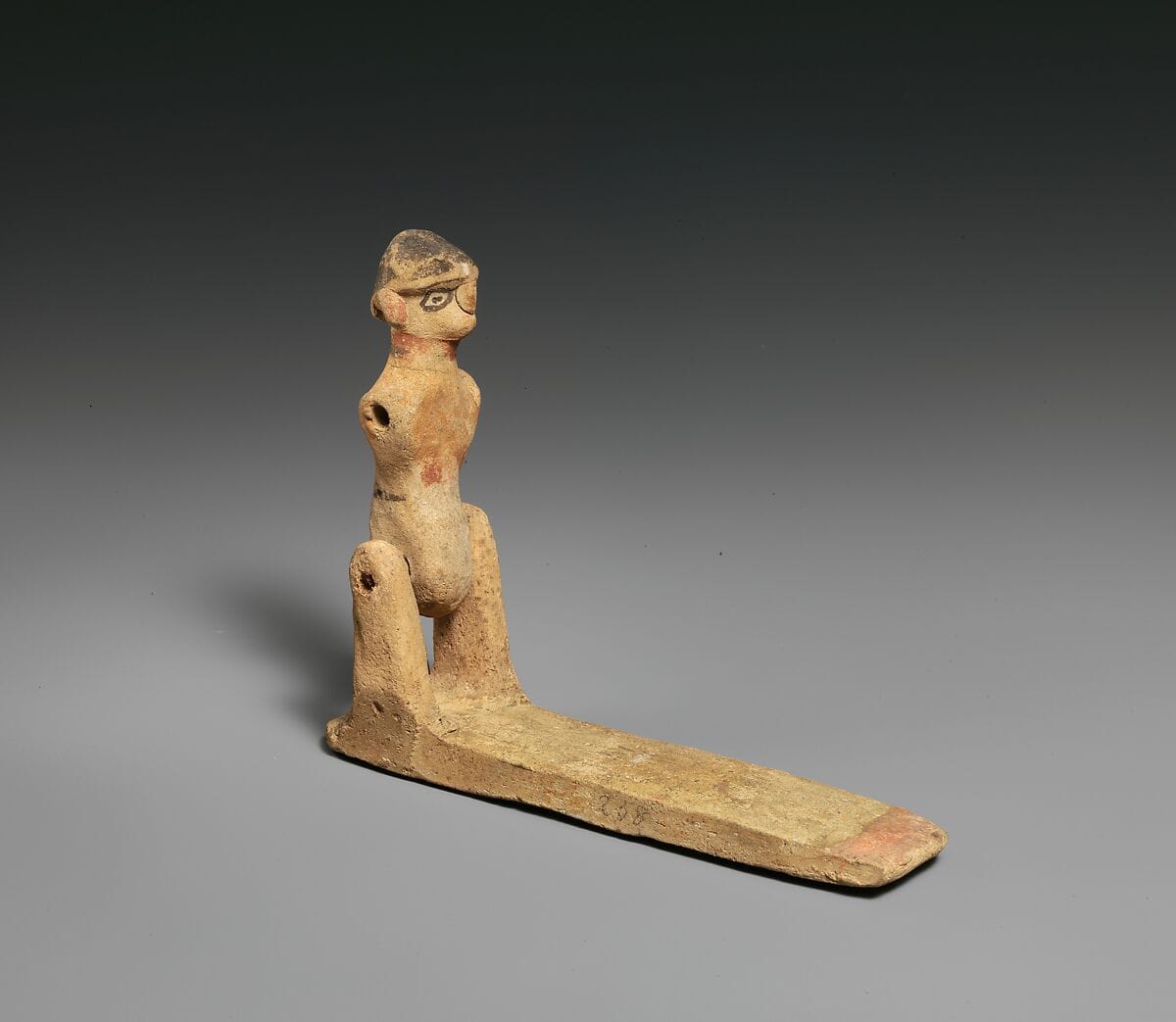 Toy in the form of a male(?) figure, Archaic II Cypriot statue