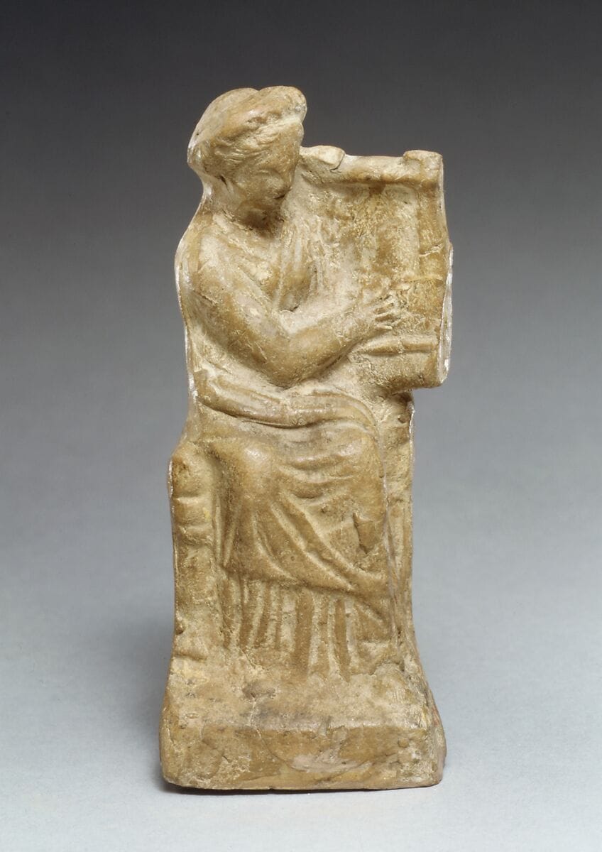 Terracotta statuette of a seated woman playing a kithera, Hellenistic Cypriot