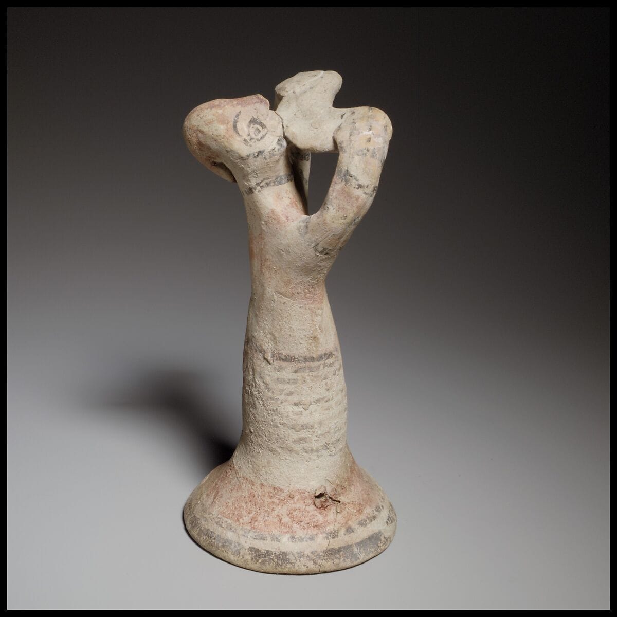 Terracotta statuette of a male flute-player, Archaic I Cypriot