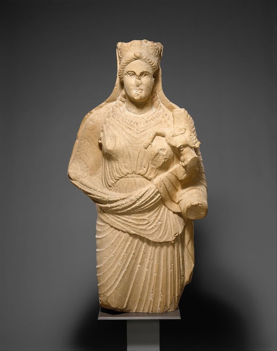 Limestone statue of Aphrodite holding winged Eros, Hellenistic Cypriot