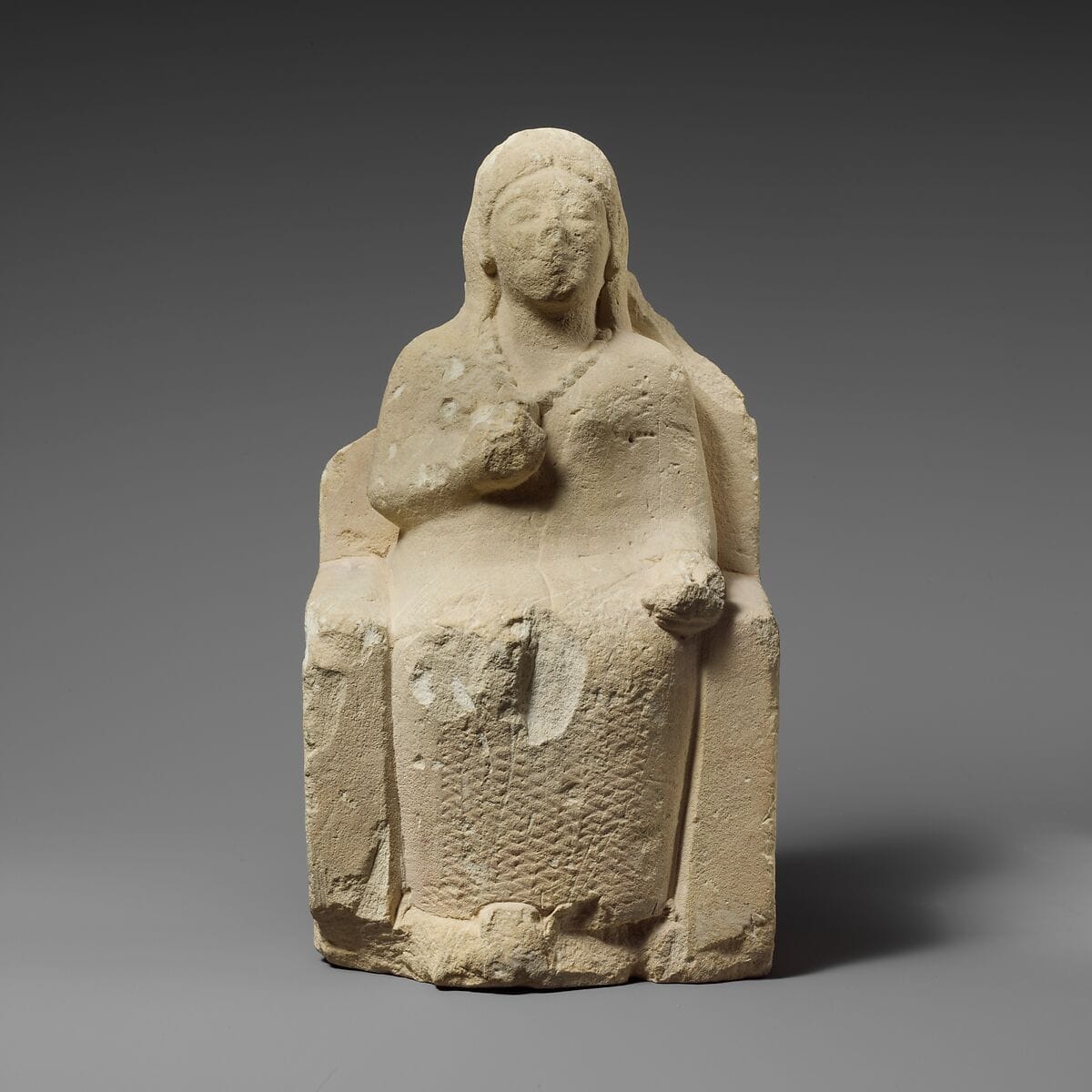 Limestone statuette of a seated female votary, Archaic II Cypriot