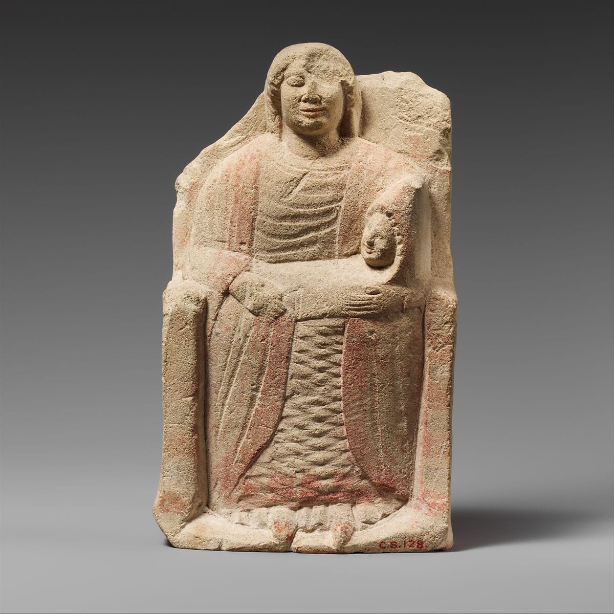 Seated limestone kourotrophos, Archaic II Cypriot statue