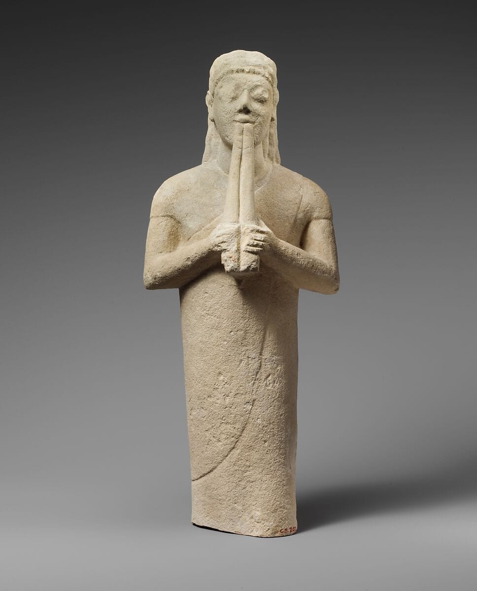 Limestone statuette of a male aulos player, Archaic II Cypriot