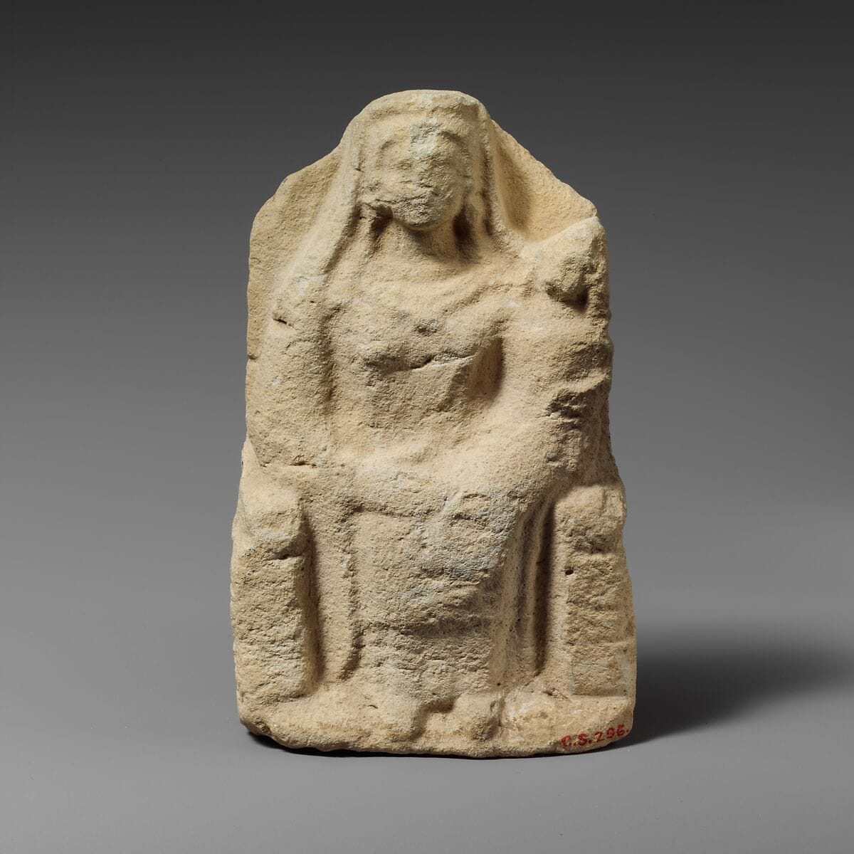 Seated limestone kourotrophos, Classical Cypriot statue