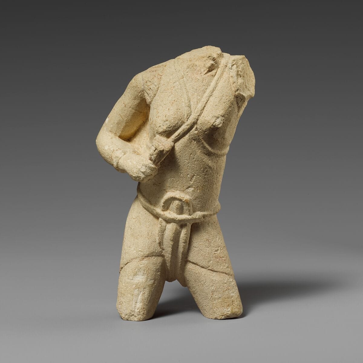 Torso of a limestone fighting woman, Archaic II Cypriot statue