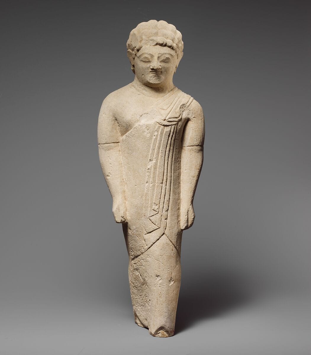 Limestone statuette of a beardless male votary in Greek dress, Archaic II Cypriot