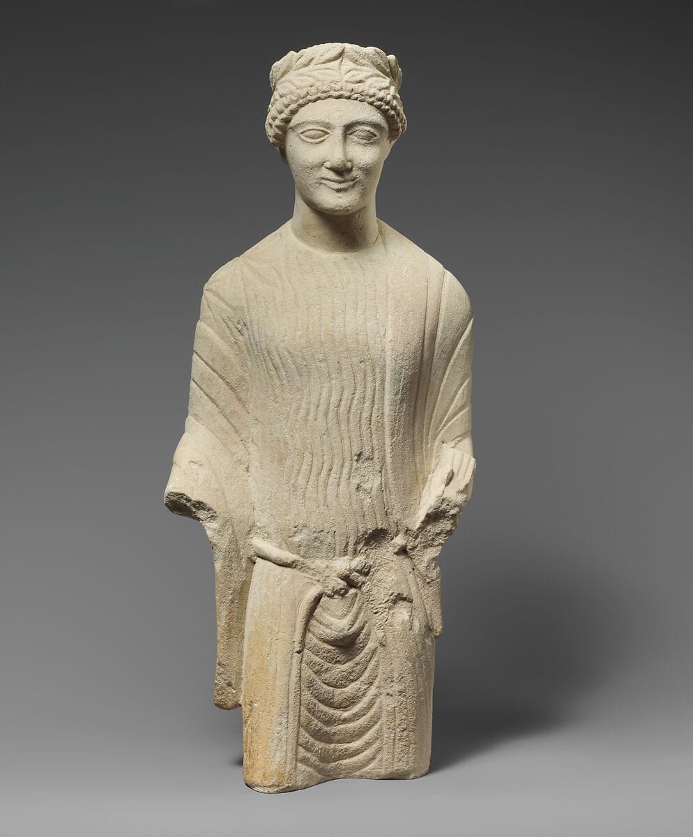 Limestone statuette of a beardless male votary with a wreath of leaves, Classical Cypriot