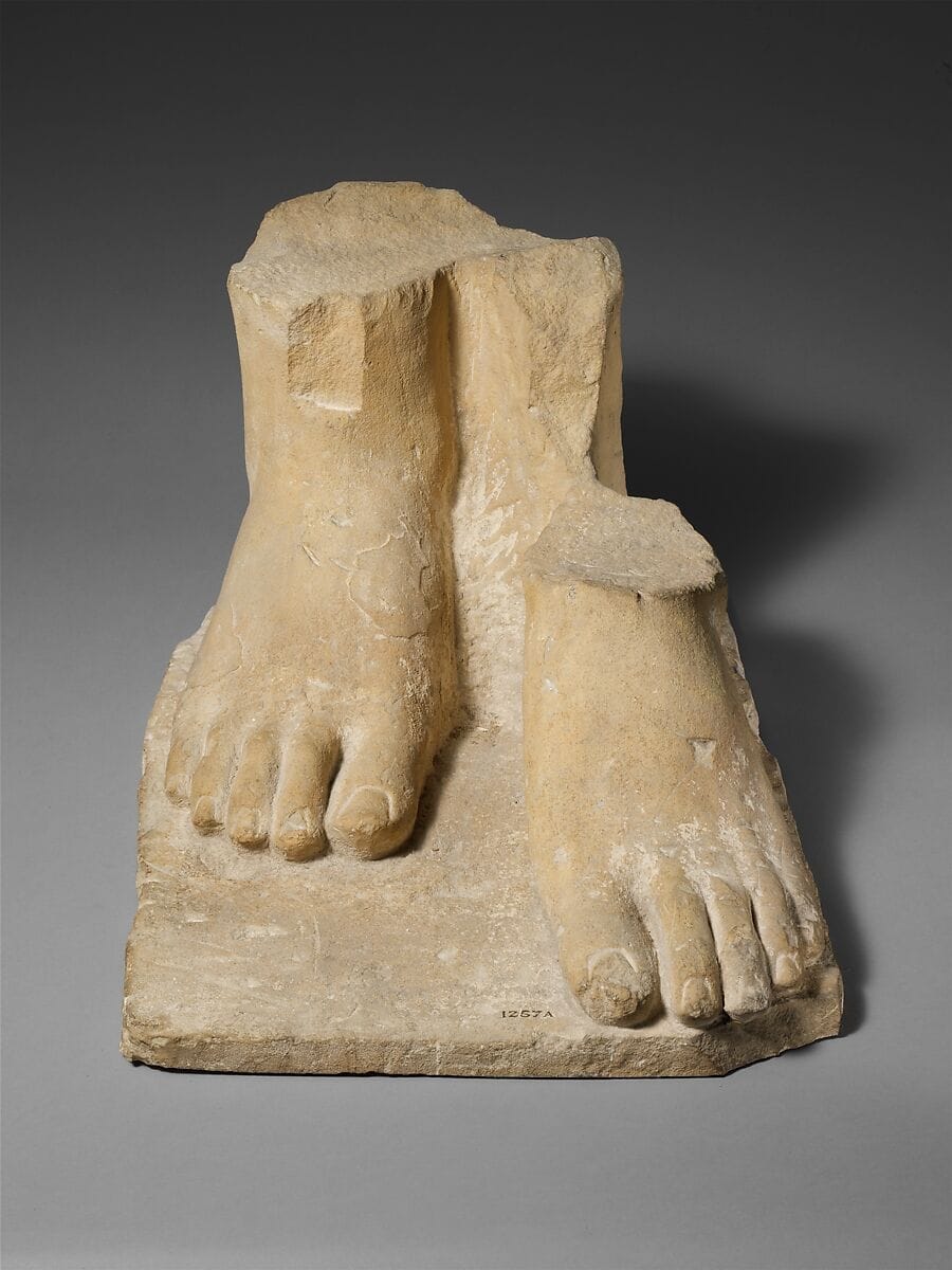 Limestone plinth with the feet of a colossal male statue, Archaic II Cypriot