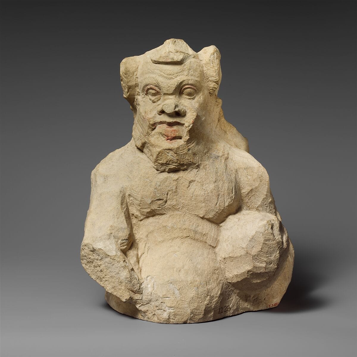 Fragment of a partly unfinished limestone statuette of a silen, Hellenistic Cypriot