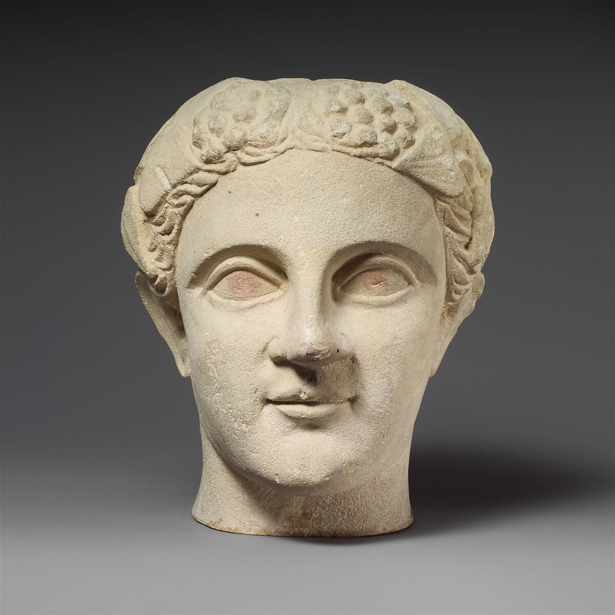 Limestone head of a wreathed youth, Classical Cypriot statue