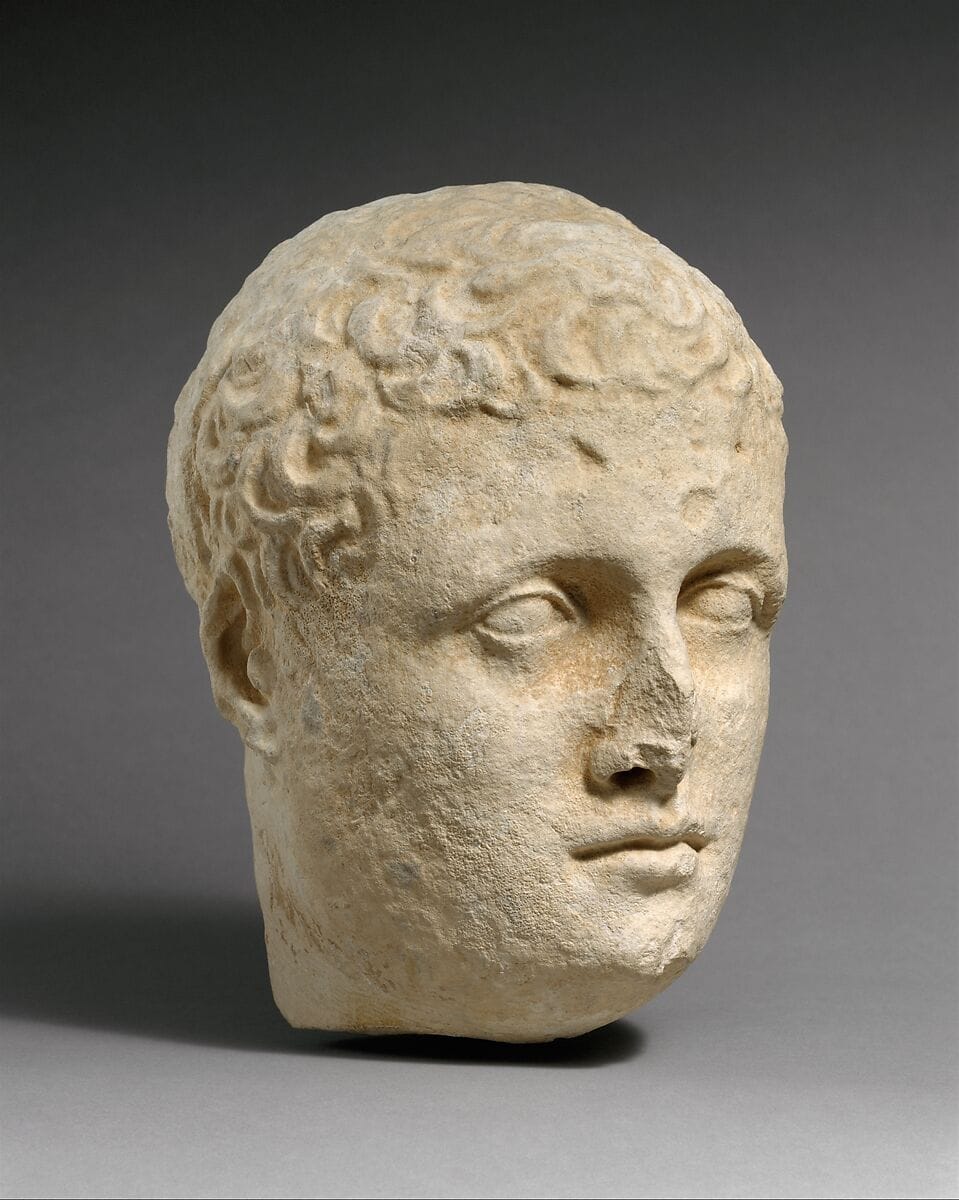 Limestone head of a beardless male votary, Roman Cypriot statue