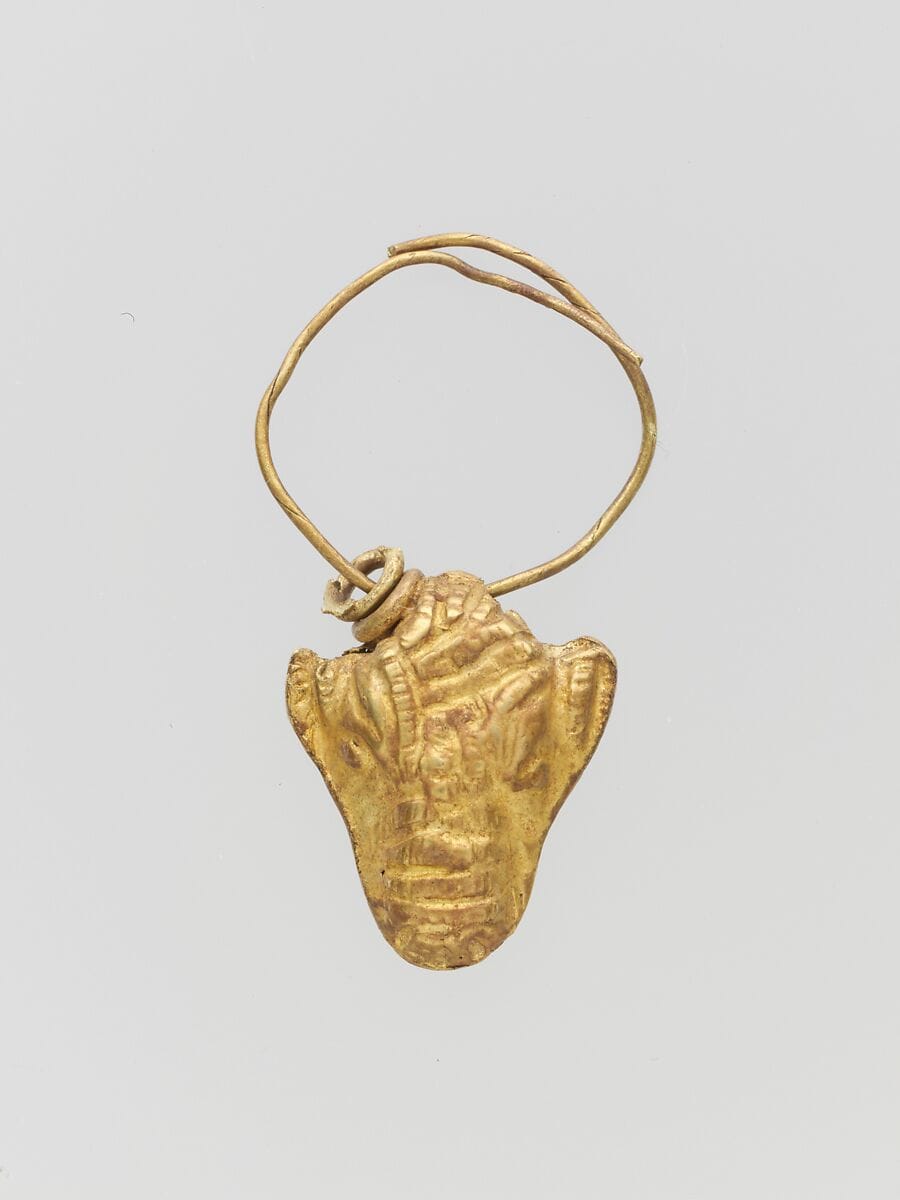 Gold pendant in the form of a bull's head, Late Bronze Age III Cypriot jewelry