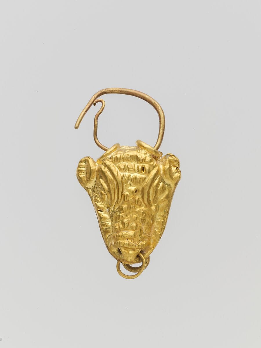 Gold pendant in the form of a bull's head, Late Bronze Age III Cypriot statue
