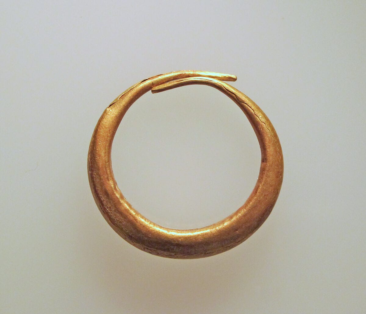 Earring of simple form, Bronze Age Cypriot jewelry